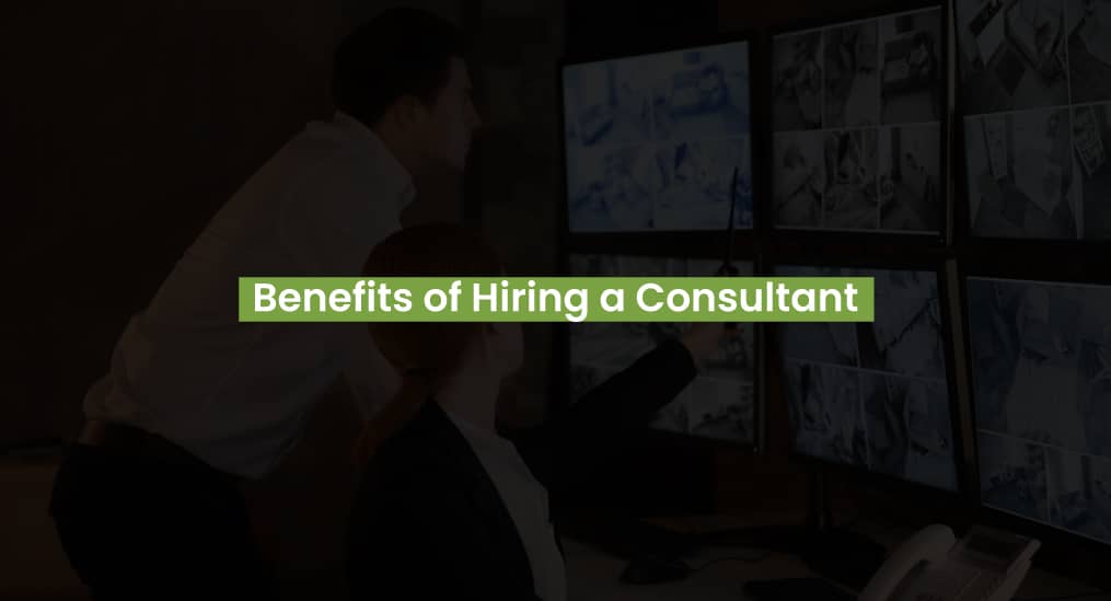 Two professionals discuss CCTV footage, with "Benefits of Hiring a Consultant" displayed.